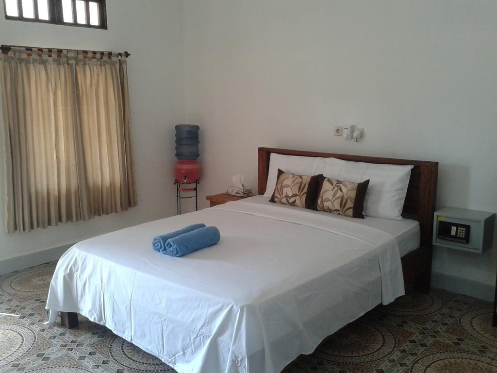 Putri Homestay Gili Meno Pokoj fotografie